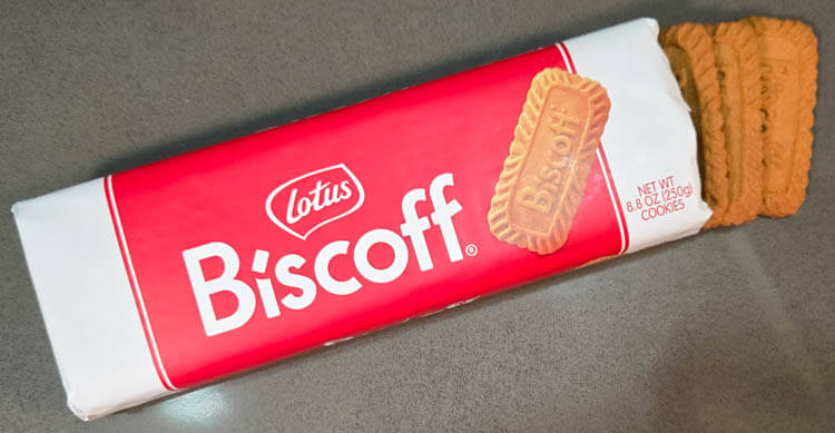 a photo of 8oz package of Biscoff cookies with 3 cookies coming out