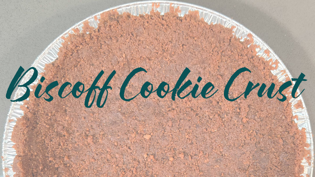Biscoff cookie pie crust recipe header image with half a biscoff pie crust with text overlay that reads "biscoff cookie crust"