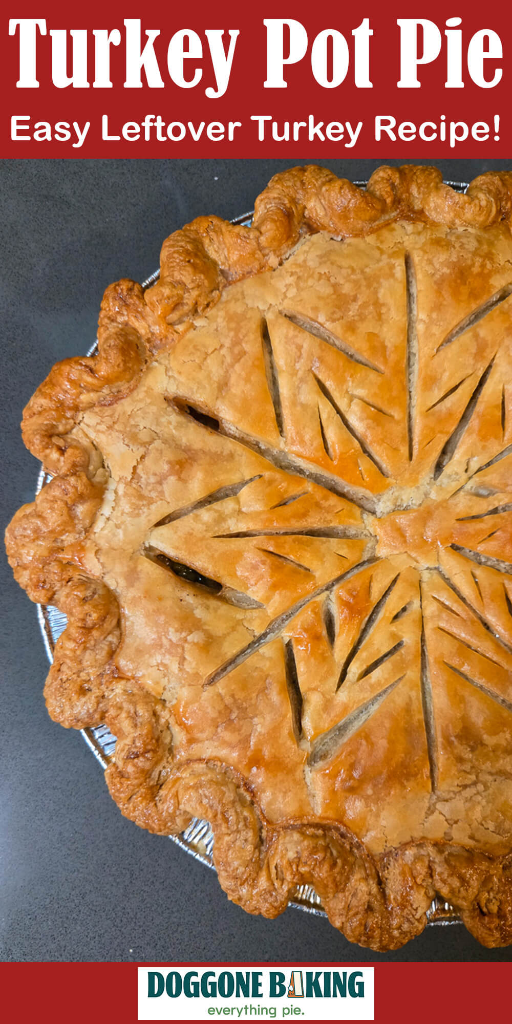 Golden baked turkey pot pie with a decorative scored top crust and crimped edges, overhead view
