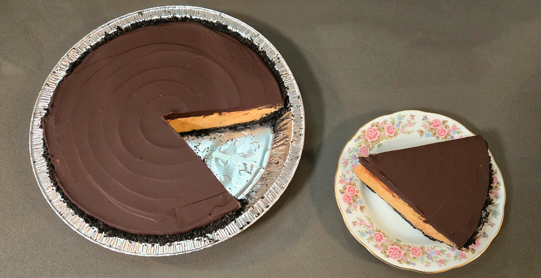 overhead photo of a no bake peanut butter pie with a slice cut out and placed next to it