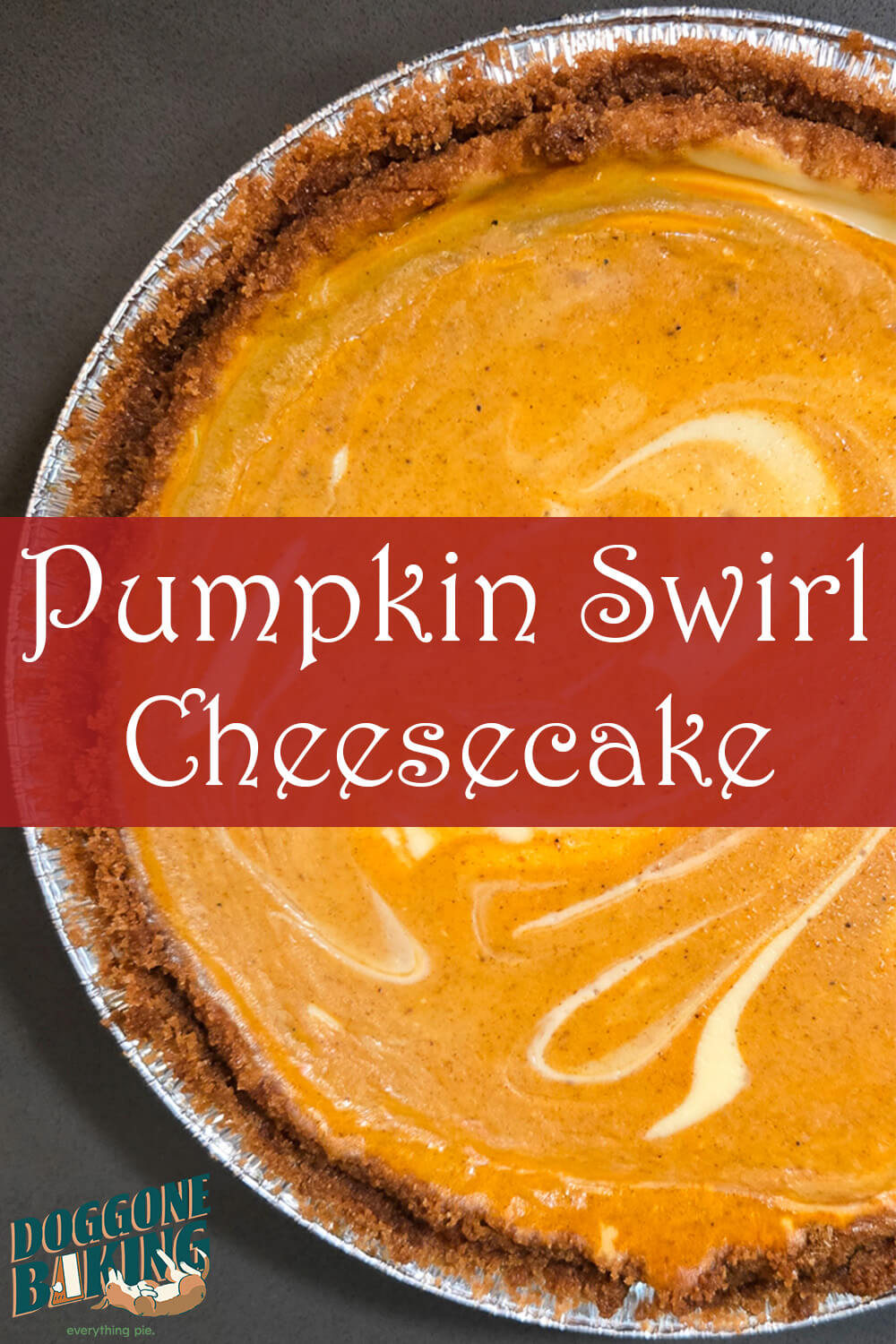 Overhead view of a pumpkin swirl cheesecake with a cream cheese swirl pattern on top and a graham cracker crust. Text overlay reads "Pumpkin Swirl Cheesecake." Doggone Baking logo in the bottom left corner.